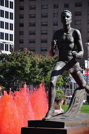 Statue in a red fountain